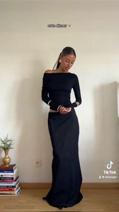 Minimalist outfit, black outfit, matching set, chic outfit, long skirt, black long skirt Fitted Black Skirt Outfit, Long Skirt Evening Outfit, Long Skirt Going Out Outfits, Black Silk Long Skirt Outfit, Long Stripe Skirt Outfit, Maxi Skirt With Long Sleeve Top, All Black Long Skirt Outfit, Black Maxi Skirt Fall Outfit, Maxi Skirt Outfit Formal