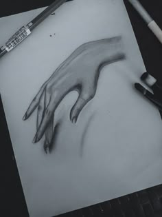 a pencil drawing of a hand reaching out to touch someone's hand with their fingers