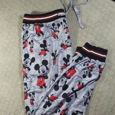 Mickey Mouse Gray Sleep Pants By Disney Feature Drawstring/Elastic Waist And Elastic Cuffs. Nwot Condition. Size: L Body Materials: 92% Polyester / 8% Spandex Rib/Waist Band & Leg Cuffs: 60% Cotton/ 40% Polyester Approximate Measurements Laying Flat Waist: 17" Length: 30" Disney Pajama Pants, Flannel Pajama Bottoms, Plus Size Disney, Disney Animators Collection, New Mickey Mouse, Disney Pajamas, Womens Pajamas Pants, Plaid Pajamas, Flannel Pajamas