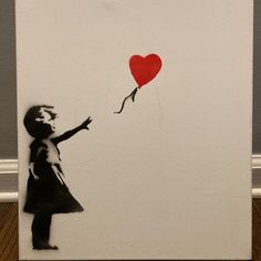 a painting of a girl holding a red balloon with a heart shaped sticker on it