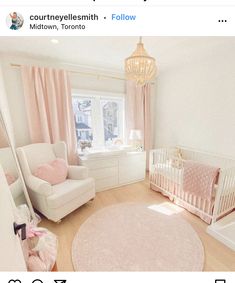 a baby's room is decorated in pink and white