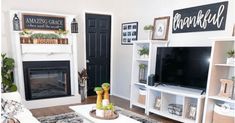 a living room filled with furniture and a flat screen tv on top of a wooden stand