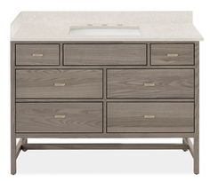 an image of a bathroom vanity with white counter top and grey wooden drawer drawers on the bottom