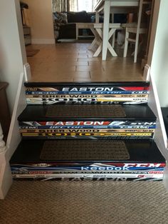 some skis that are sitting on the stairs