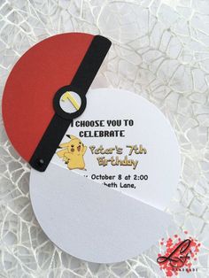 a close up of a ping pong paddle with a birthday card attached to it