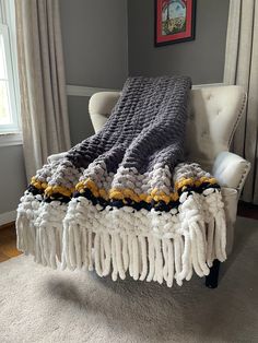 Chunky Knit Fringe Blanket | Gray and Yellow Knit Throw - Hands On For Homemade Gray Chunky Knit Blanket, Black And White Chunky Knit Blanket, Knit Blanket Color Schemes, Chunky Blanket Color Ideas, Chunky Knit Blanket Ideas, Chunky Finger Knit Blanket, Chunky Knit Blanket Pattern Color Combos, Green Chunky Knit Blanket, Big Yarn Blanket