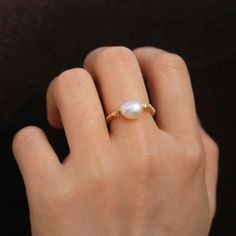 This ring features a unique design with a middle size freshwater pearl encircled by small irregular gold vermeil beads, strung together with a stretchy rubber band. 18k gold plated Sterling silver based Freshwater pearl measures 9*7mm Stretchy from US size 5-7 Ring sizing chart Jewelry Care Needed Stretchy Rings, Personalized Gift Cards, Jewelry Aesthetic, Rubber Band, Rubber Bands, Gold Plated Sterling Silver, Sizing Chart, Earring Necklace, Jewelry Care