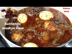 an image of stew in a pot on the stove with words above it that read authentic waakye stew