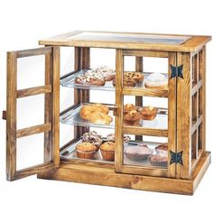 a wooden display case filled with lots of pastries