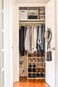 an organized closet with shoes, hats and bags