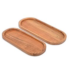 two wooden trays sitting next to each other