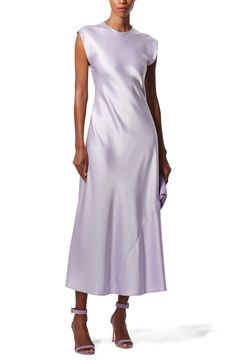 Old Hollywood couture is newly represented by this runway-starring dress sewn from bias-cut satin in a virtually seamless construction. 54" length (size 2) Back keyhole with hook-and-eye closure Jewel neck Cap sleeves Unlined 83% triacetate, 17% polyester Dry clean Made in Italy Designer Clothing Hispanic & Latinx Owned/Founded Lilac Satin Dress, Carolina Herrera Dresses, Gingham Linen, What Is Fashion, Ankle Length Dress, Dress Crafts, Lilac Dress, Pleated Midi Dress, Satin Midi Dress