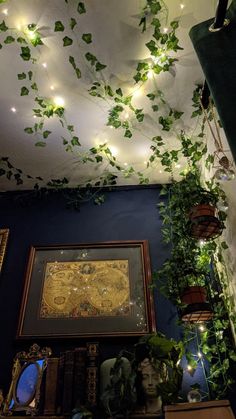 the ceiling is covered with vines and lights