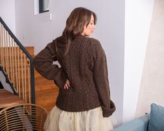 "MATERIAL : 2 strands of 100 % alpaca yarn COLOUR : Brown ( There may be a slight difference because of the different monitors' representation) ♥ In the picture the model is wearing a garment with these measurements : A: ( Body Length) : 30 \" / 76 cm B: (Chest width) : 19.7 \" / 50 cm C : (Sleeve from armpit) : 24 \" / 61 cm D: (Neck unrolled) : They are taken with the item laid flat and not streched. ♥ For choosing your size please look at size chart in our listing pictures. Please check caref Brown Chunky Knit Crew Neck Outerwear, Alpaca Turtleneck Sweater For Fall, Fall Mohair Cable Knit Sweater, Knitted Alpaca Sweater For Fall, Brown Mohair Knitted Sweater, Hand Knitted Mohair Sweater For Fall, Winter Brown Alpaca Sweater, Alpaca Crew Neck Sweater In Chunky Knit, Alpaca Crew Neck Sweater With Chunky Knit