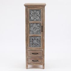 a wooden cabinet with two drawers and an intricate design on the front, against a white background