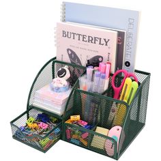 an organized desk organizer with pens, markers and pencils in green mesh bins