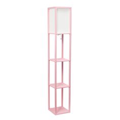 a pink shelving unit with a mirror on the top and bottom shelf, in front of a white background