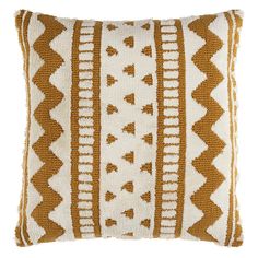 a brown and white pillow on a white background