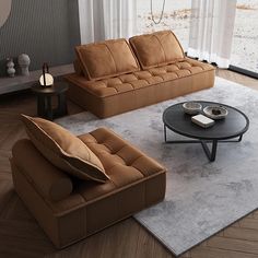 a living room with two couches and a coffee table in front of a window