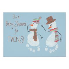 two snowmen with hats and scarves on their heads