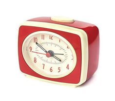 a small red and white clock on a white background with the time at 11 00