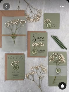 wedding stationery with flowers and save the date cards