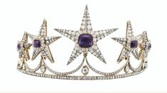 This tiara is beautifully silver-plated and encrusted with sparkling clear genuine zirconium stones of various sizes in Star shapes with Amethyst. The many zirconium Stones make this crown sparkle in any light and are prong set by hands! This piece is versatile and compliments many different styles, can be worn for Weddings, Bridal Showers, Birthdays, Baby Showers, Graduation, Maternity Shoots or any special occasions! Handmade Star and CelestialTiaras/Crown Made to Order Diamond Weight -- 12.43 Amythyst Crown, Star Tiara, Handmade Tiaras, Magnificent Jewels, Maternity Shoots, Tiaras Jewellery, Diamond Tiara, Crown Tiara, Diamond Crown