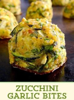 zucchini garlic bites on a baking sheet with the title overlaying it