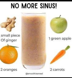 there is a smoothie in the glass with ingredients to make it look like an apple, carrots, and ginger