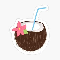 a coconut drink with a straw and flower sticker