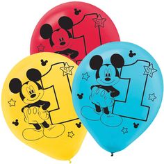 three mickey mouse balloons with the number one on them