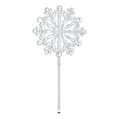 a white snowflake on a stick is shown in front of a white background