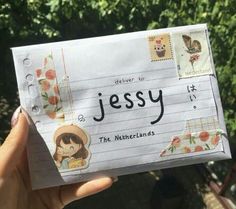 someone is holding up a piece of paper with the words jessy on it