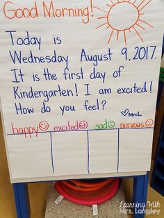 a sign that reads good morning today is wednesday august 1, 2017 it is the first day of kindergarten i am excited how do you feel?