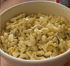 a white bowl filled with macaroni and cheese