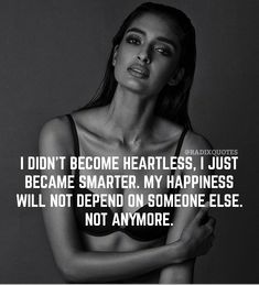 a woman with her arms crossed and the words i don't become heartless, just become smarter, my happiness will not defend someone else