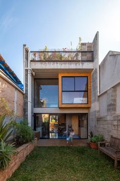 the house is made up of concrete and wood