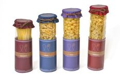 four containers filled with different types of macaroni and cheese