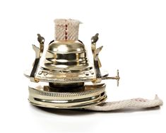 an old fashioned brass bell with rope on the side and two handles, sitting on a white surface