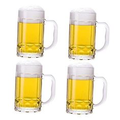 four beer mugs filled with light yellow liquid