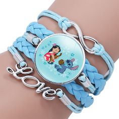 a bracelet with a cartoon character on the front and blue braiding around it's wrist