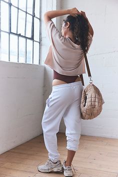 These essential joggers are a must-have for your daily workout commute, featuring a soft terry fabrication with a flattering high-rise silhouette. **Fit:** Relaxed fit; high-rise; ankle length **Features:** Soft, terry fabrication; elasticated waistband with drawstring; elasticated cuffs; side seam pockets; high-rise **Why We | Wanna Play Joggers by FP Movement at Free People, White, XS Relaxed Fit Sweatpants For Yoga, Relaxed Fit Athleisure Sweatpants For Yoga, Spring Athleisure Joggers For Everyday, Spring Yoga Sweatpants Relaxed Fit, Spring Yoga Sweatpants With Relaxed Fit, Spring Yoga Sweatpants In Relaxed Fit, Spring Athleisure Everyday Bottoms, Stretch Athleisure Sweats For Everyday, Spring Everyday Joggers With Ribbed Waistband