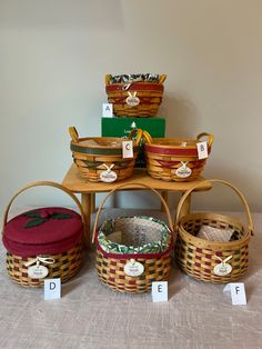 several baskets are stacked on top of each other and labeled with the letters df