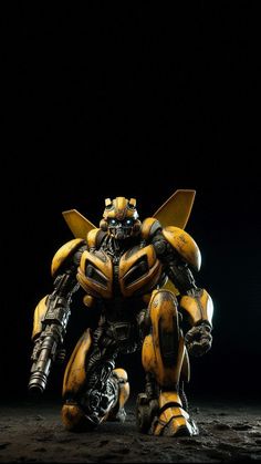 a yellow and black robot standing in the dark