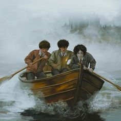 three people in a boat on the water