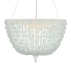 a white chandelier hanging from the ceiling