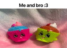 two small toy cupcakes sitting next to each other on a pink blanket with the caption me and bro 3