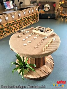 a round table made out of wooden pallets