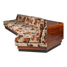 a couch that is sitting on top of a wooden table