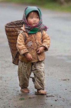 a small child with a basket on his back and a quote about the same person